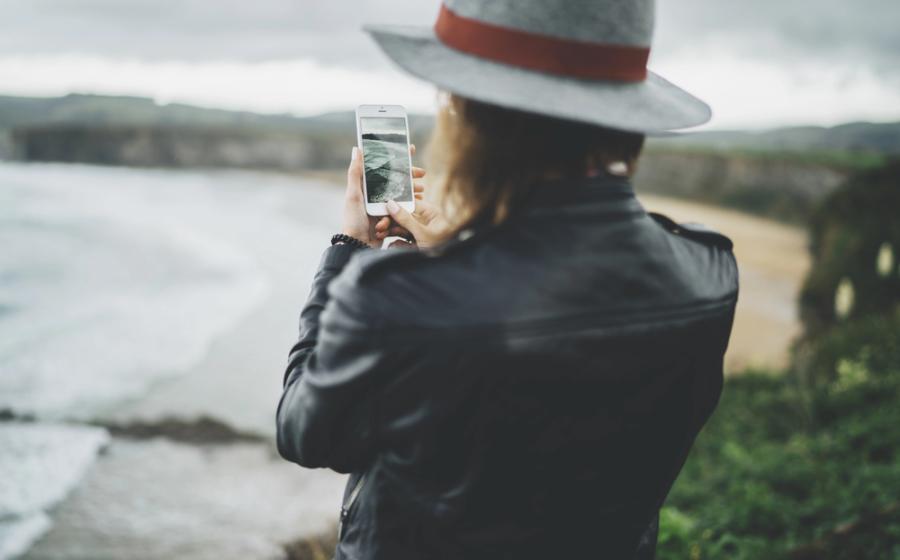Traveler girl taking a photo