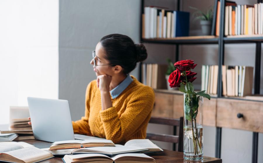 Academic working on a laptop