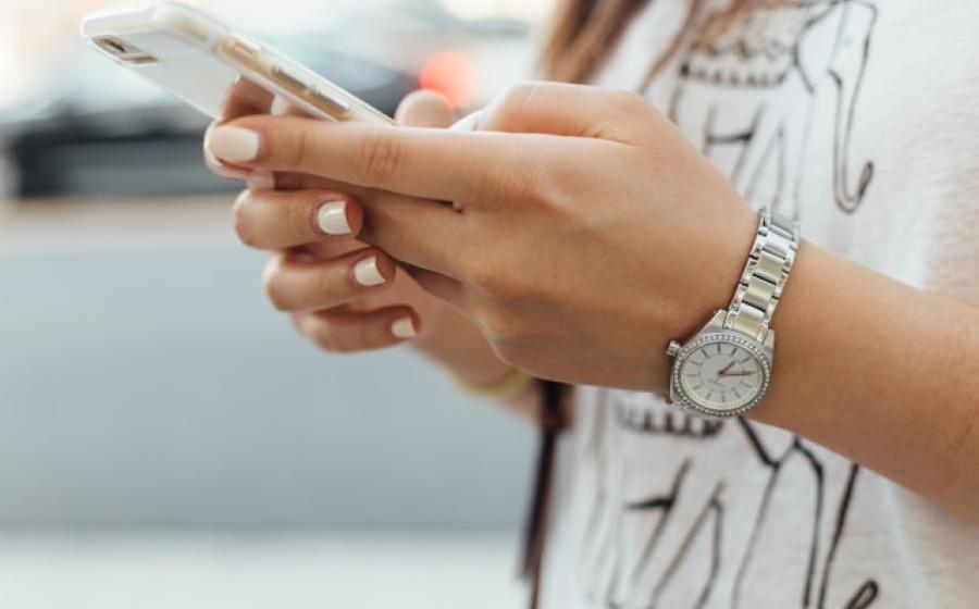 Closeup of a woman holding a cell phone