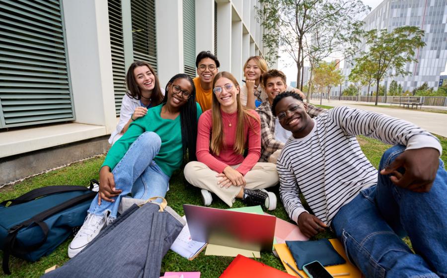 university students studying outside as a group