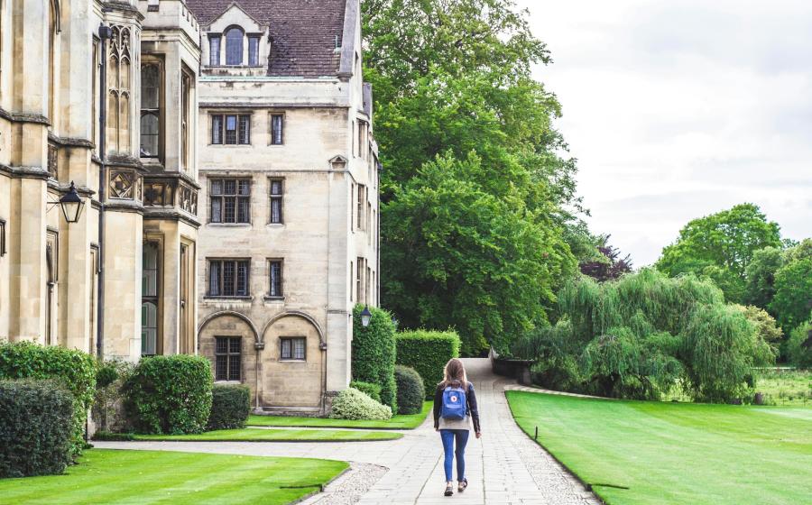 Student walking at Cambridge University