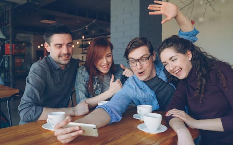 Four friends at a coffeeshop