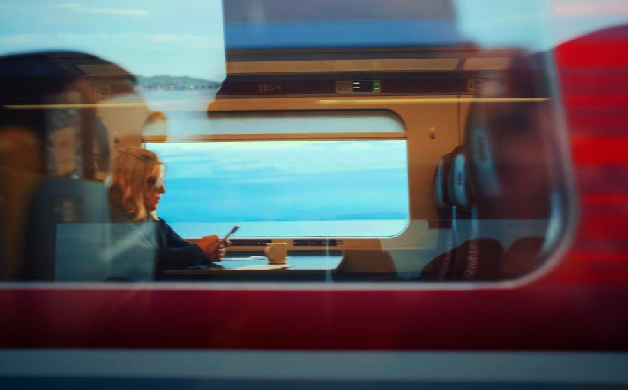 woman on phone in train