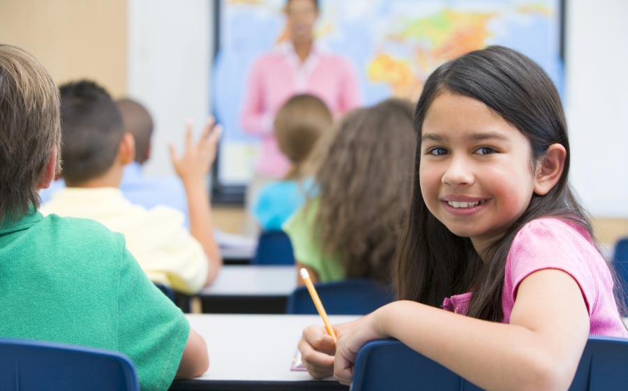 young girl in classroom