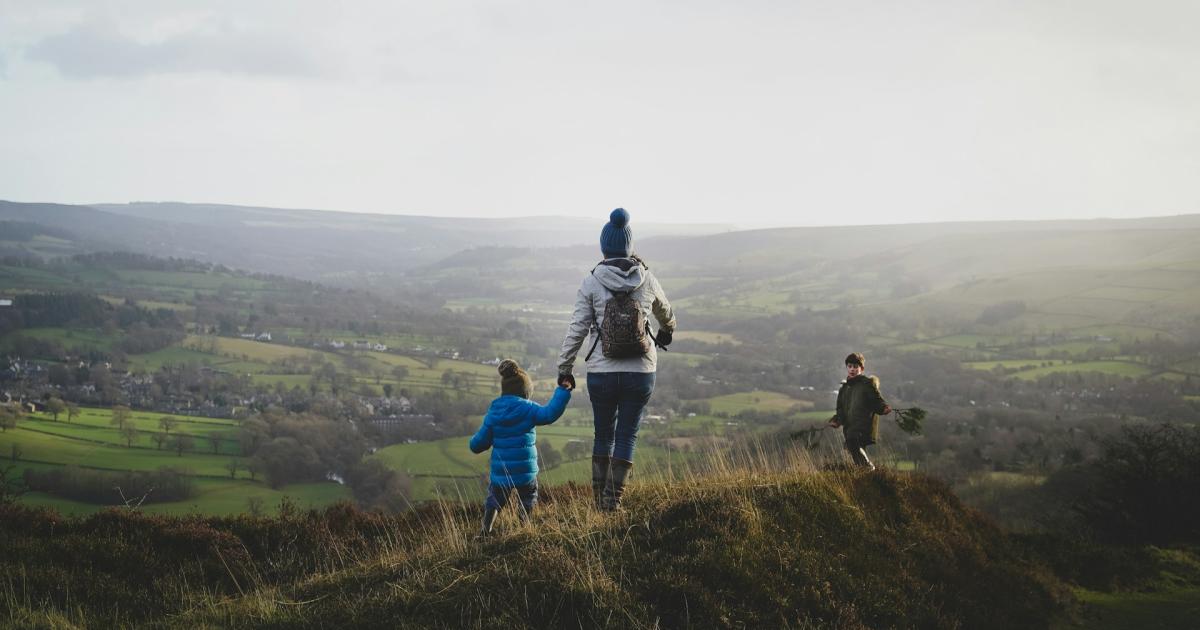  Mother and children walk in the Peaks