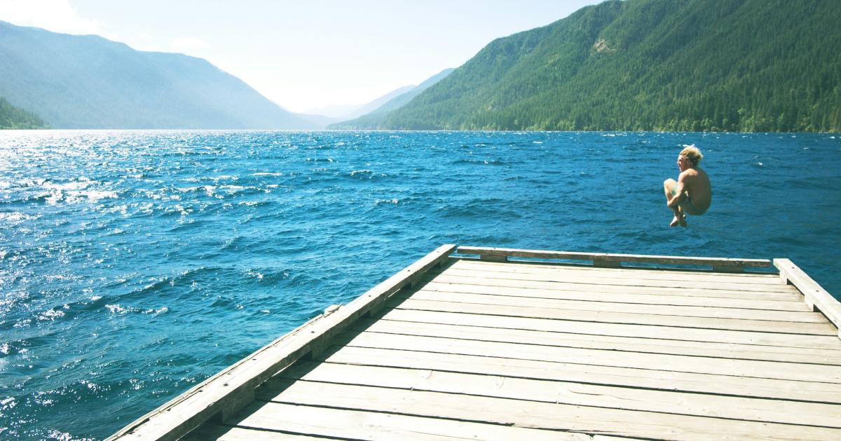 Jumping off the dock into a lake