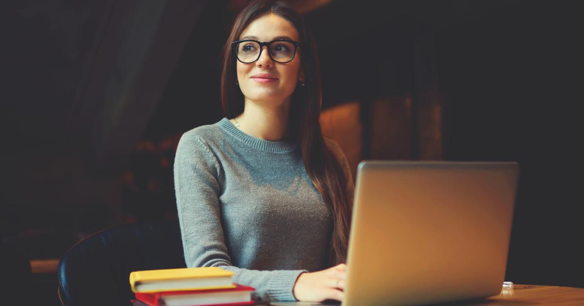 College student working on her laptop