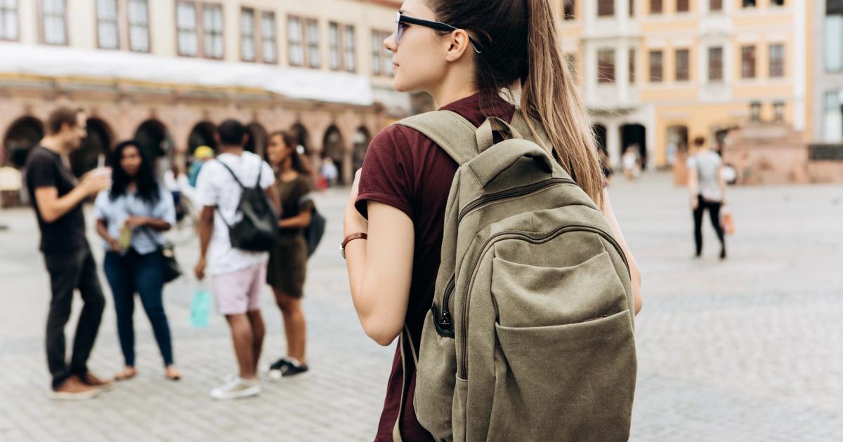 student with backpack